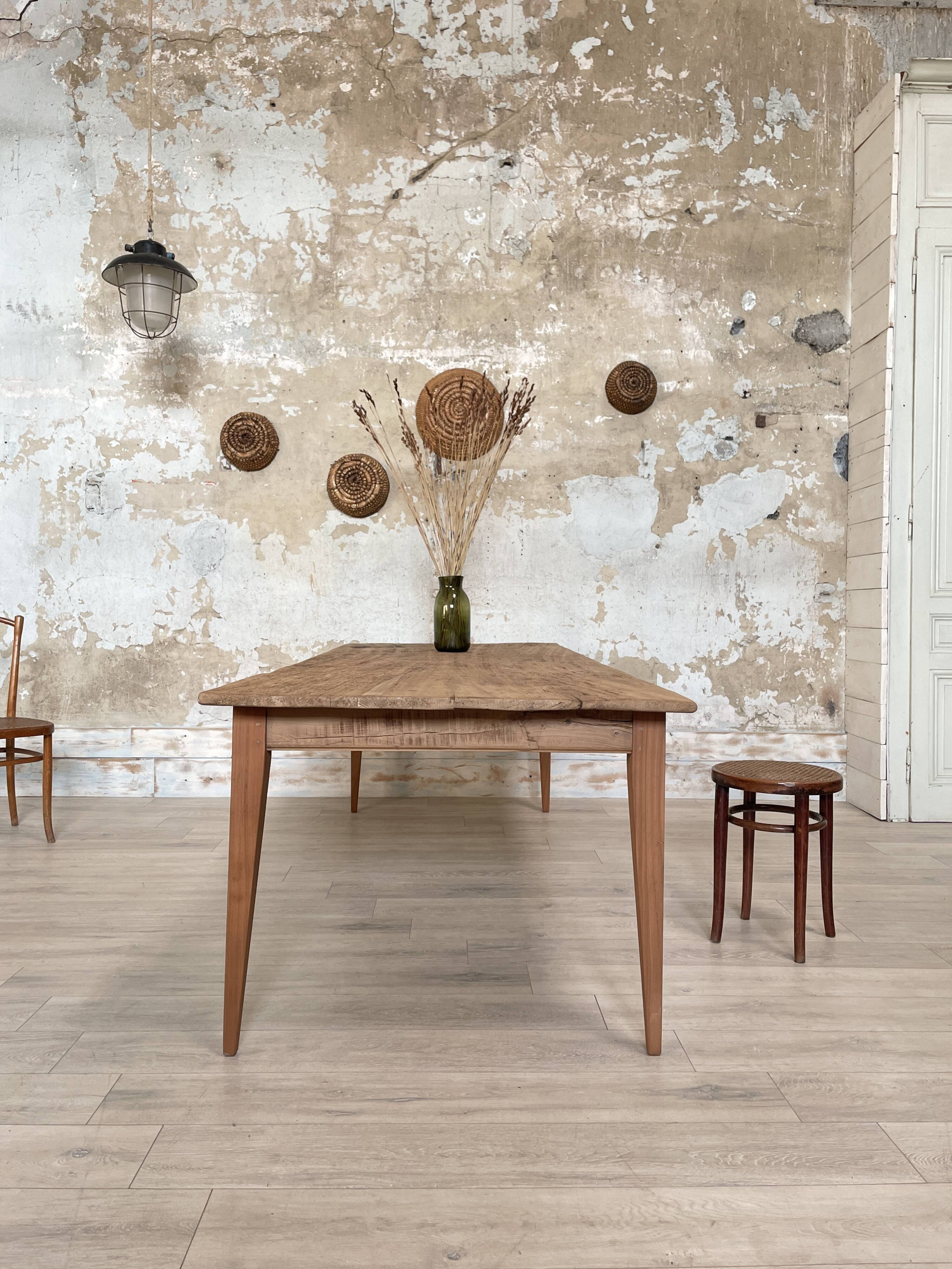 Vintage farm table with spindle legs.