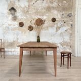 Vintage farm table with spindle legs.