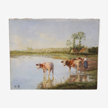 Oil on canvas depicting cows at the edge of the pond circa 1900