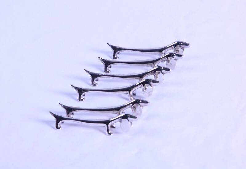 6 vintage metal dog-shaped knife holders