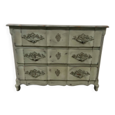Commode arbalète de style Louis XV en chêne patiné XX siècle