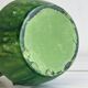 Pottery green ceramic vase with four handles.