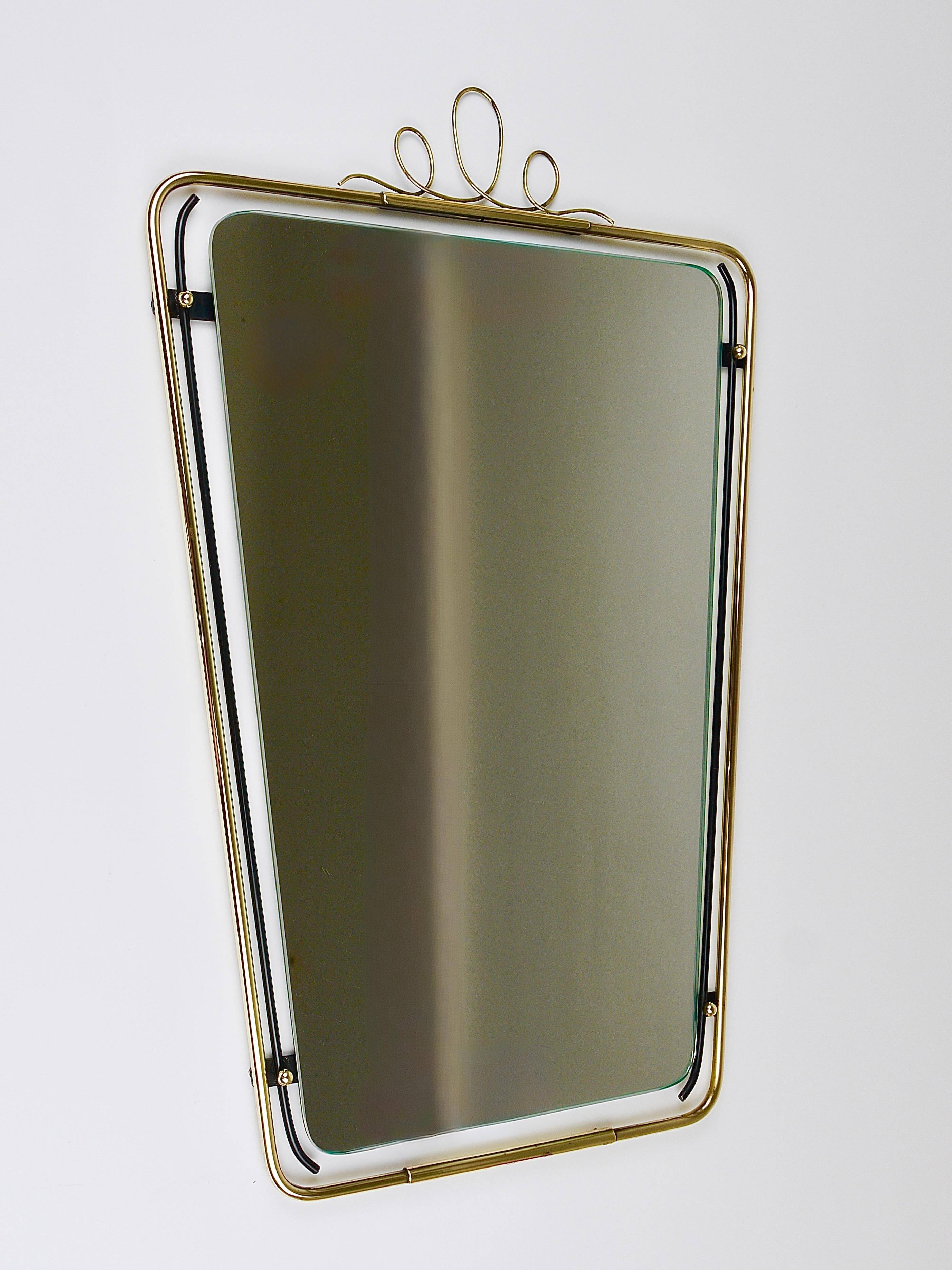 Wall mirror in brass wire with modernist loops from the mid-century, Italy, 1950s.
