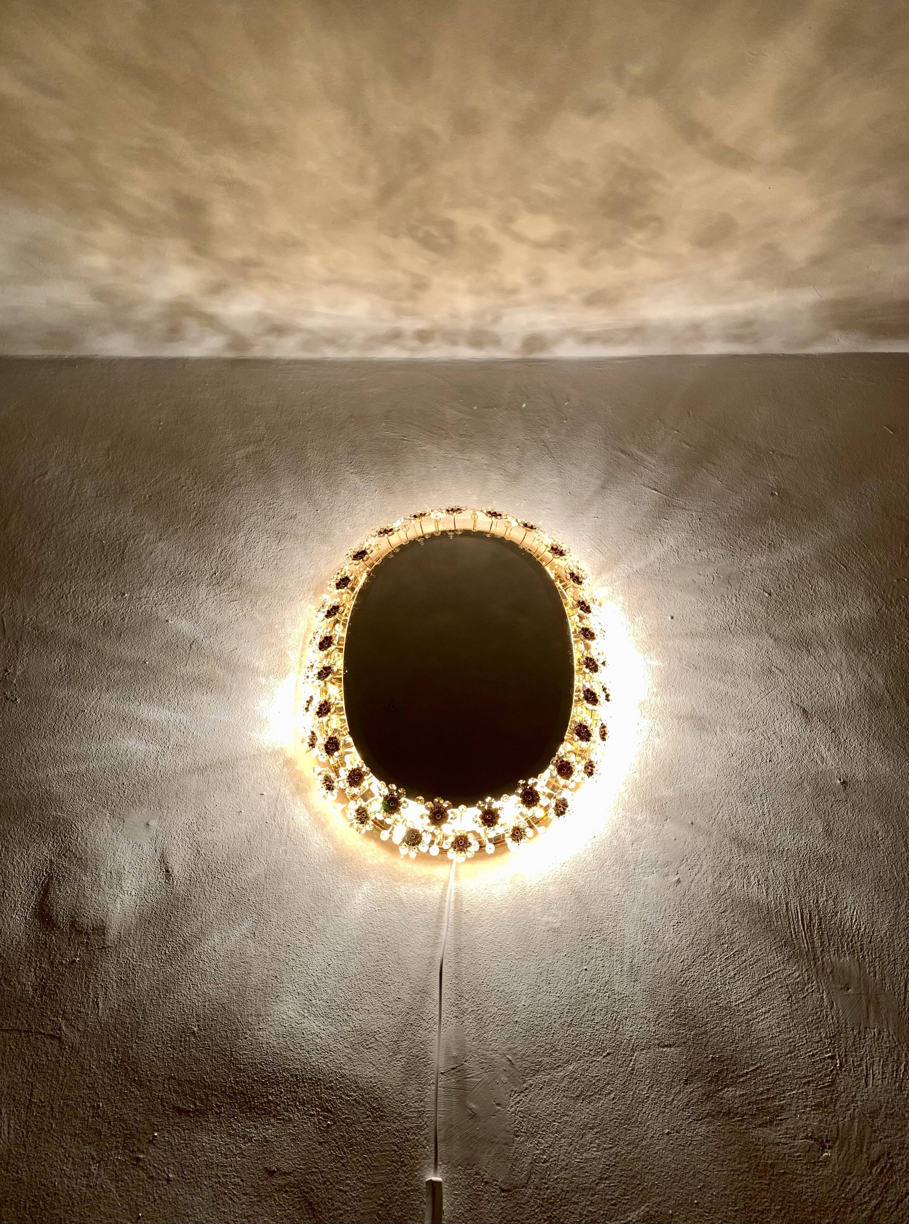 Illuminated floral mirror by Palwa