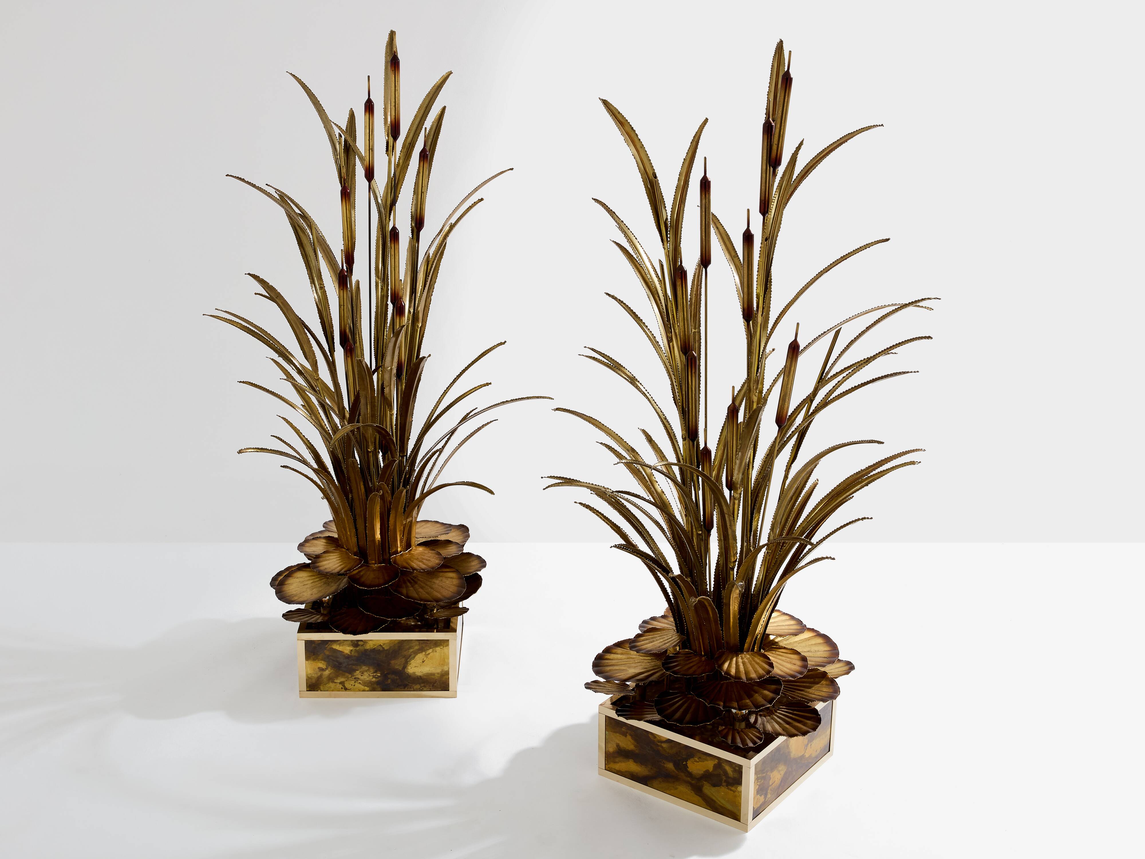 Pair of Maison Jansen brass floor lamps with reeds and water lilies, 1970s