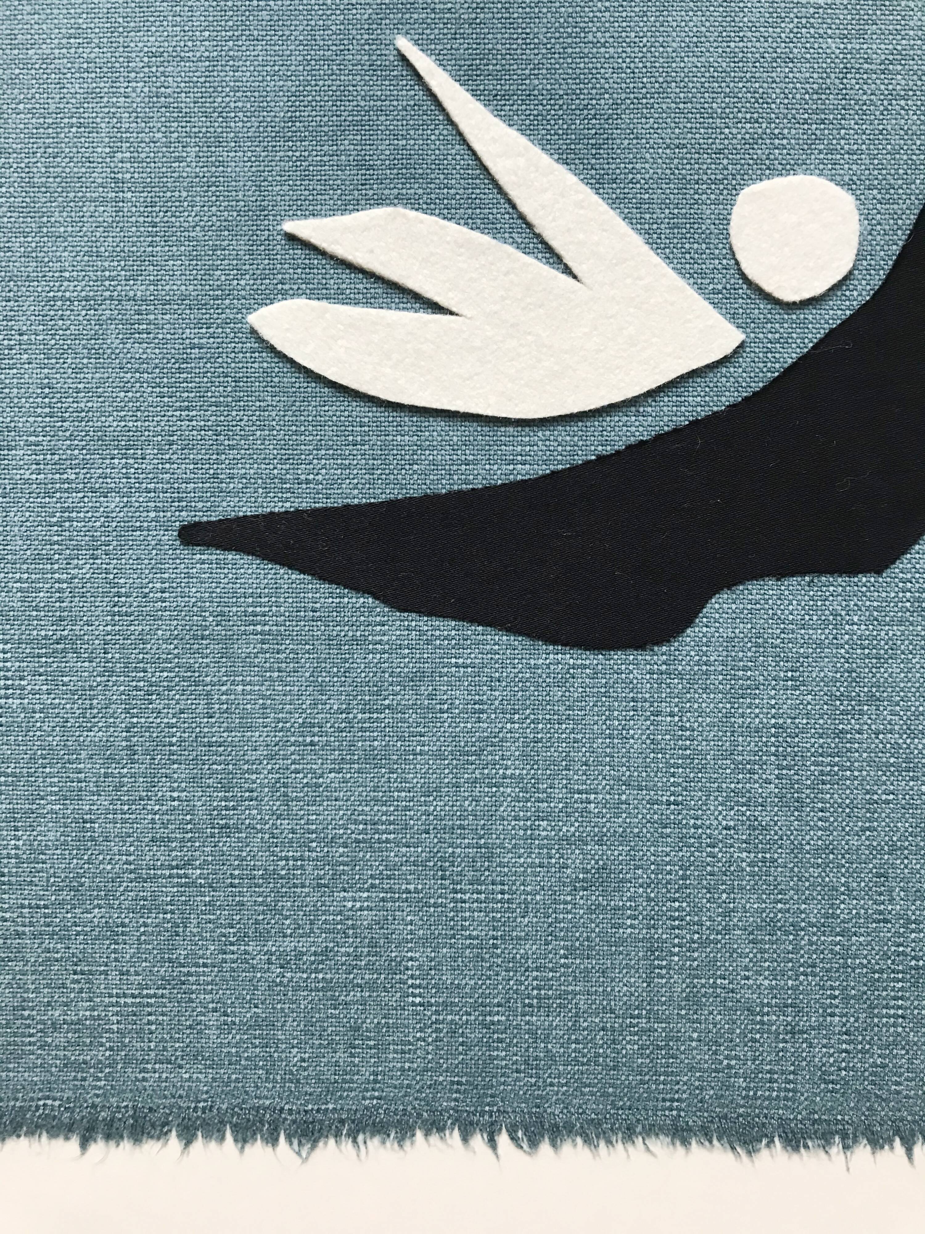 Three birds in a blue sky