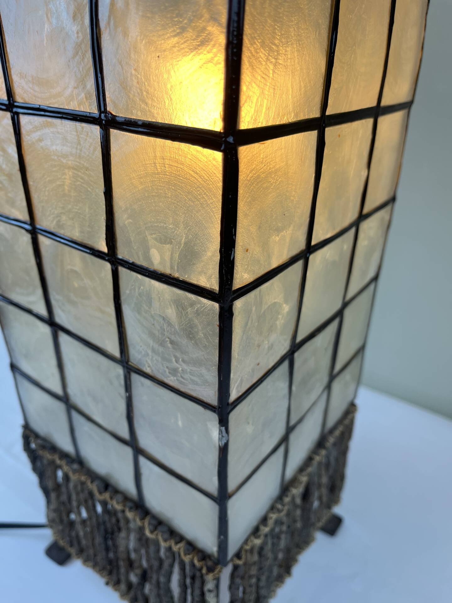 Capiz shell lamp and woven twigs