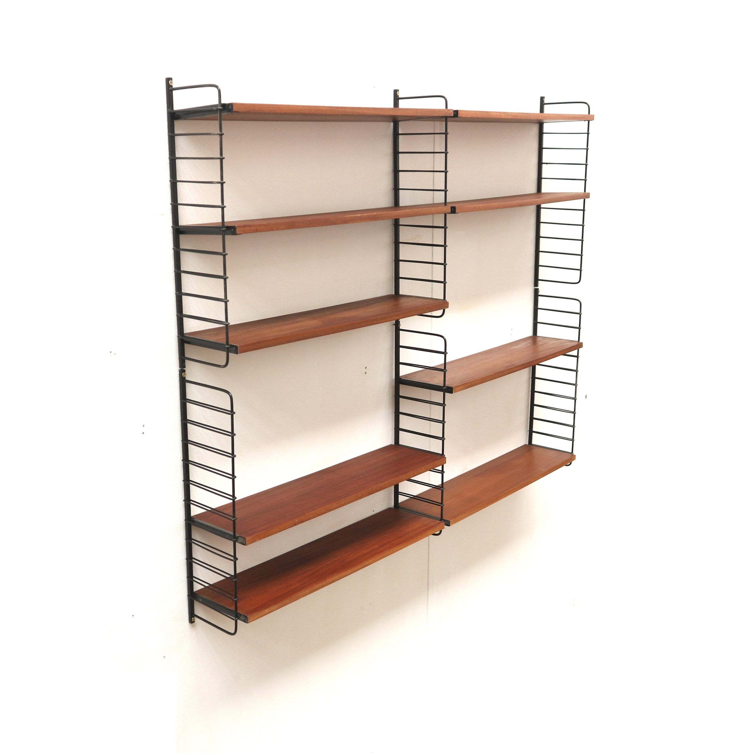 Vintage wall shelf designed by A.D. Dekker for Tomado in the 1960s