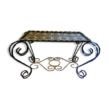 Table basse vintage fer forgé et céramique noire et dorée