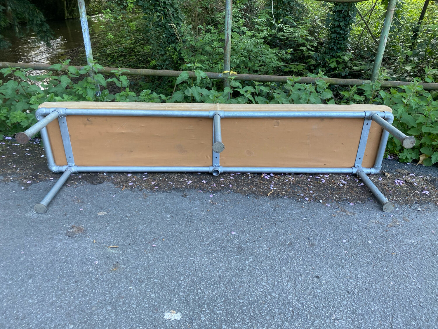 Vintage Italian industrial bench in leather and metal.