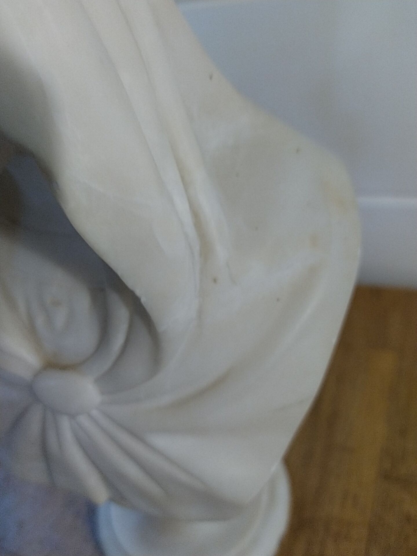Bust of the Virgin in alabaster by Guglielmo Pugi.