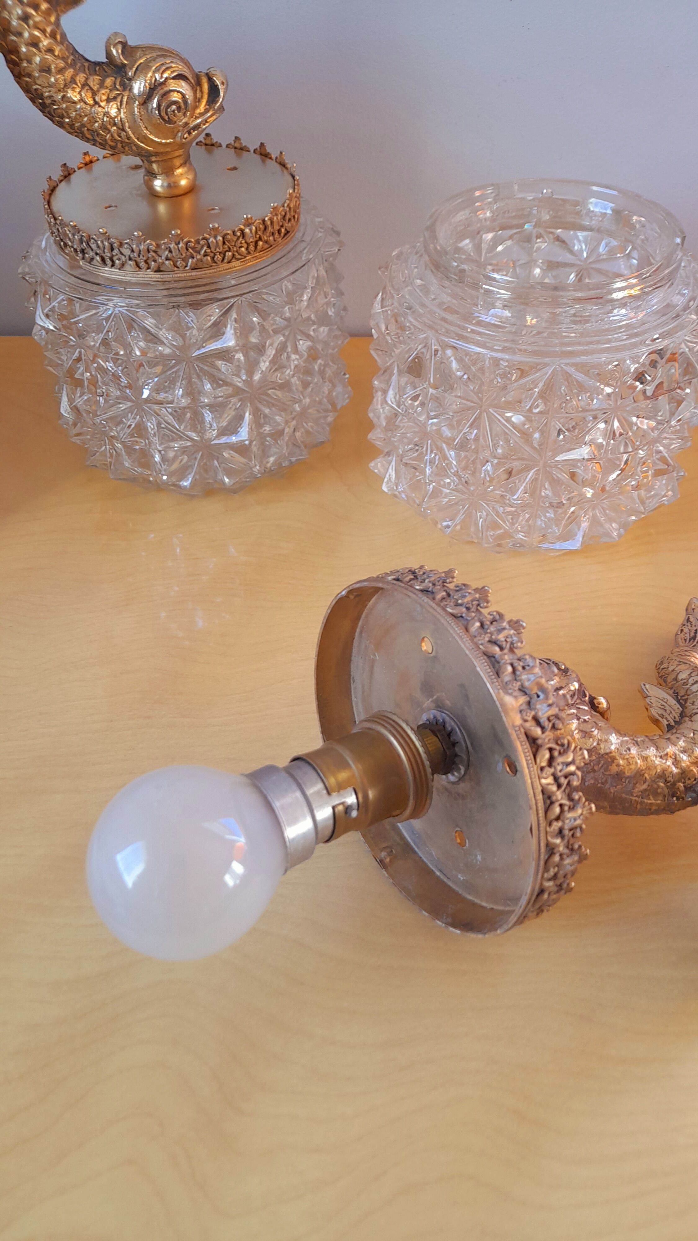 Pair of dolphin brass sconces