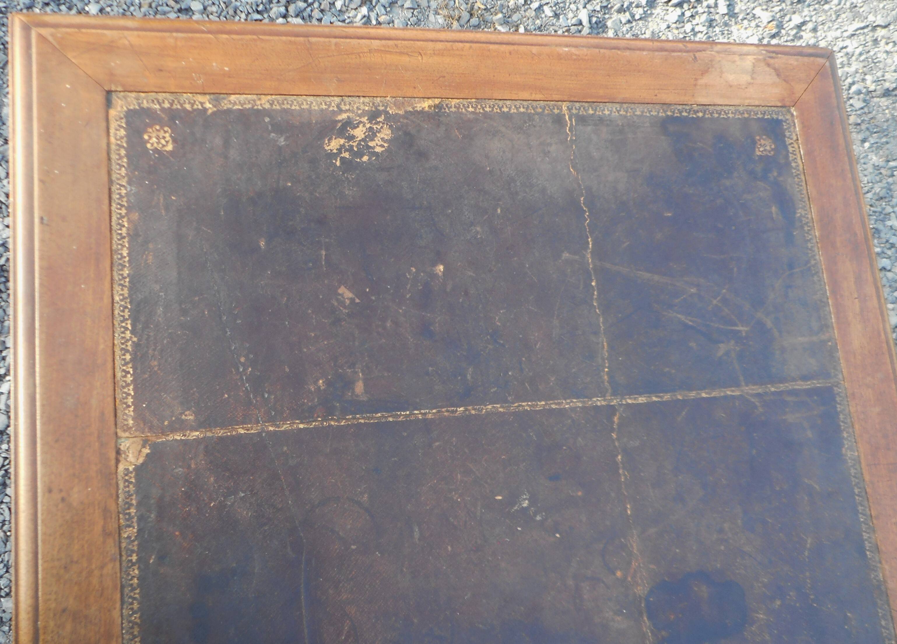 Old flat desk with brown leather top