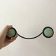 Design coat hook in sage green and black metal from the 70s