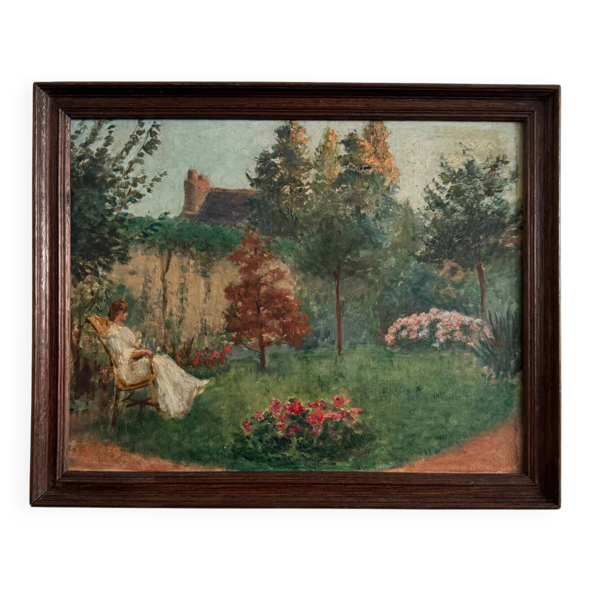 Oil on canvas park scene with a woman sitting in an armchair