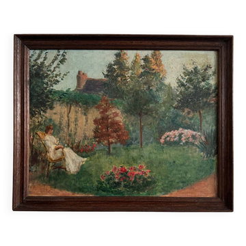 Oil on canvas park scene with a woman sitting in an armchair