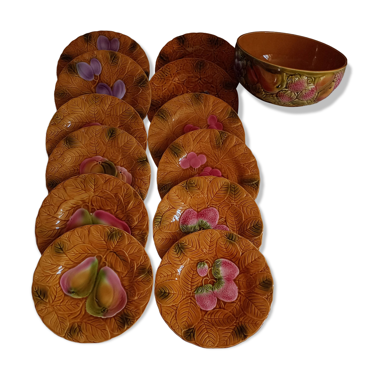 12 dessert plates and deep dishes from Salins-les-Bains, France.