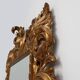 Grand miroir mural richement décoré de style baroque italien du XXe siècle