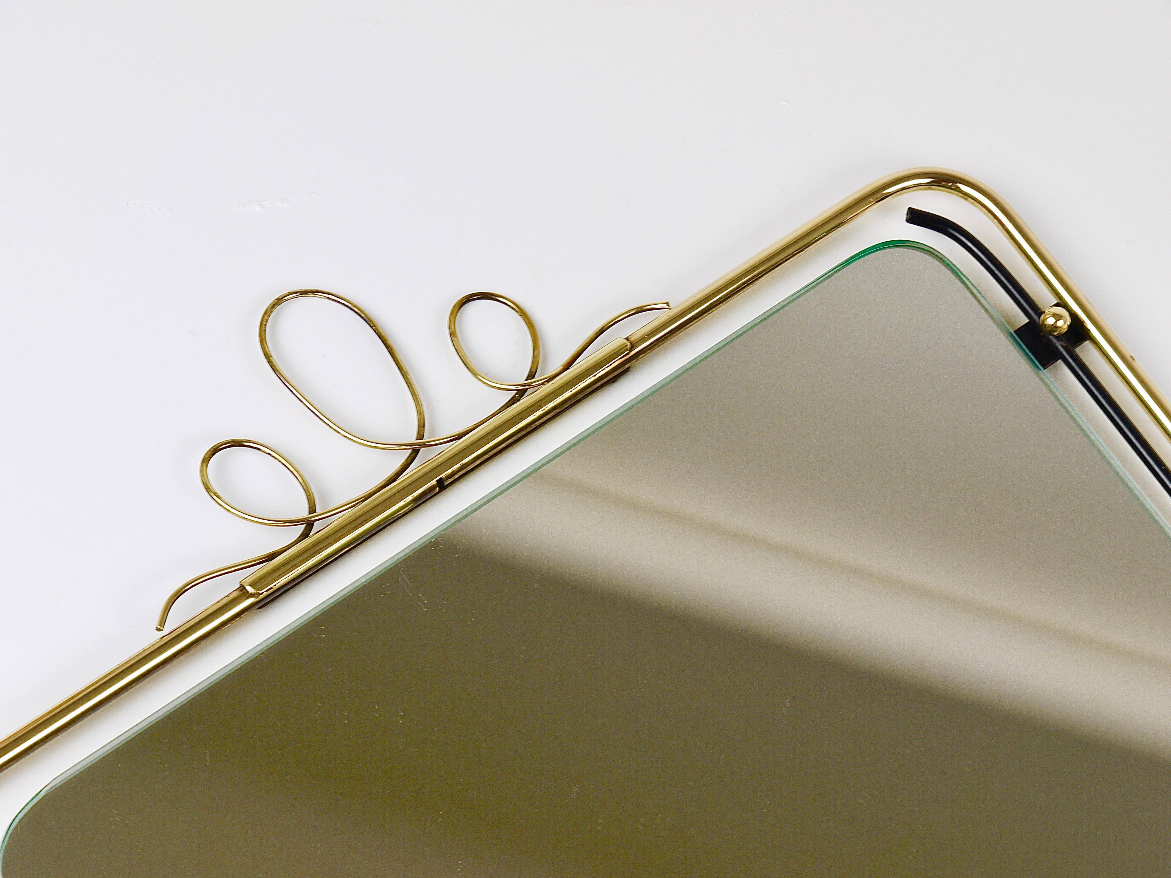 Wall mirror in brass wire with modernist loops from the mid-century, Italy, 1950s.