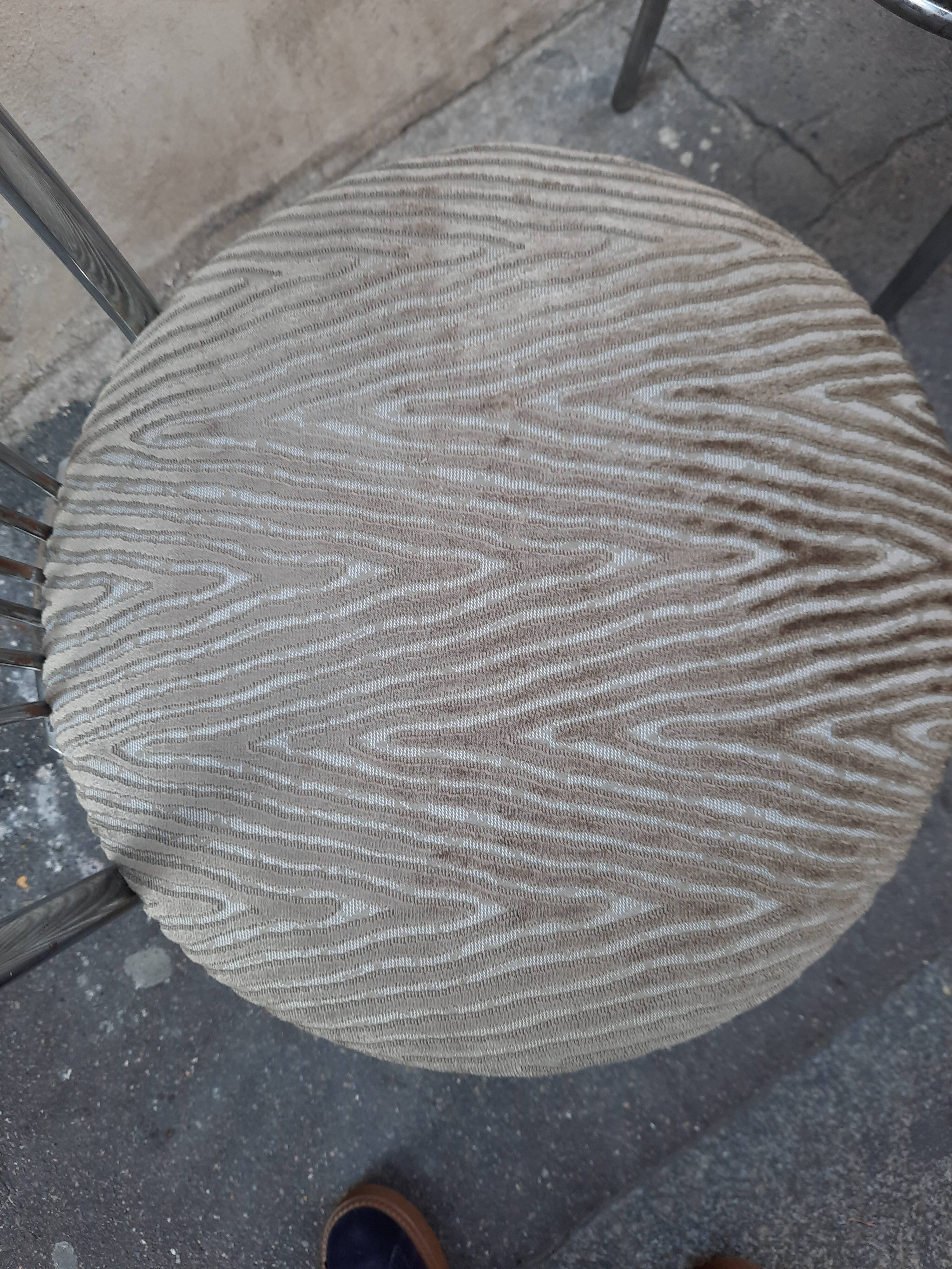 Pair of tubular metal bistro chairs