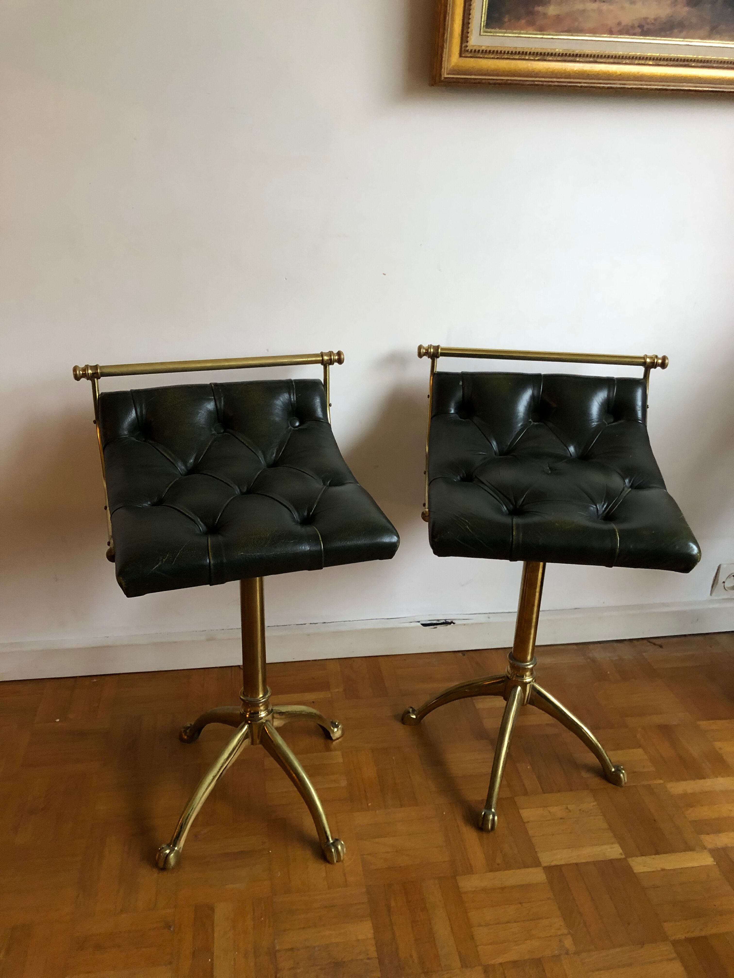 Pair of Chesterfield style brass and leather stools