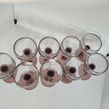 Porto glasses on colored stand x 9
