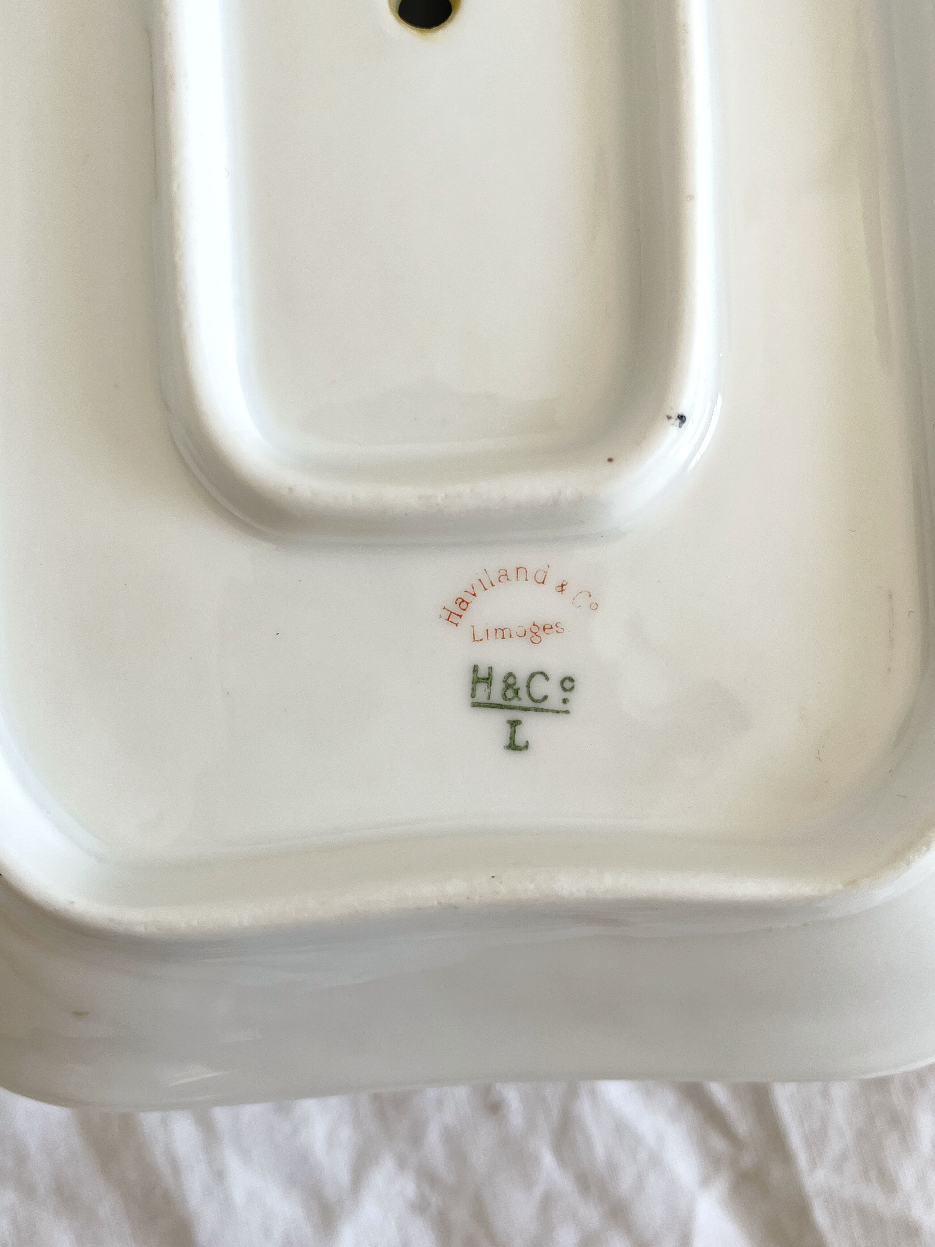 Rectangular sauce boat in Haviland Limoges porcelain with bird decoration