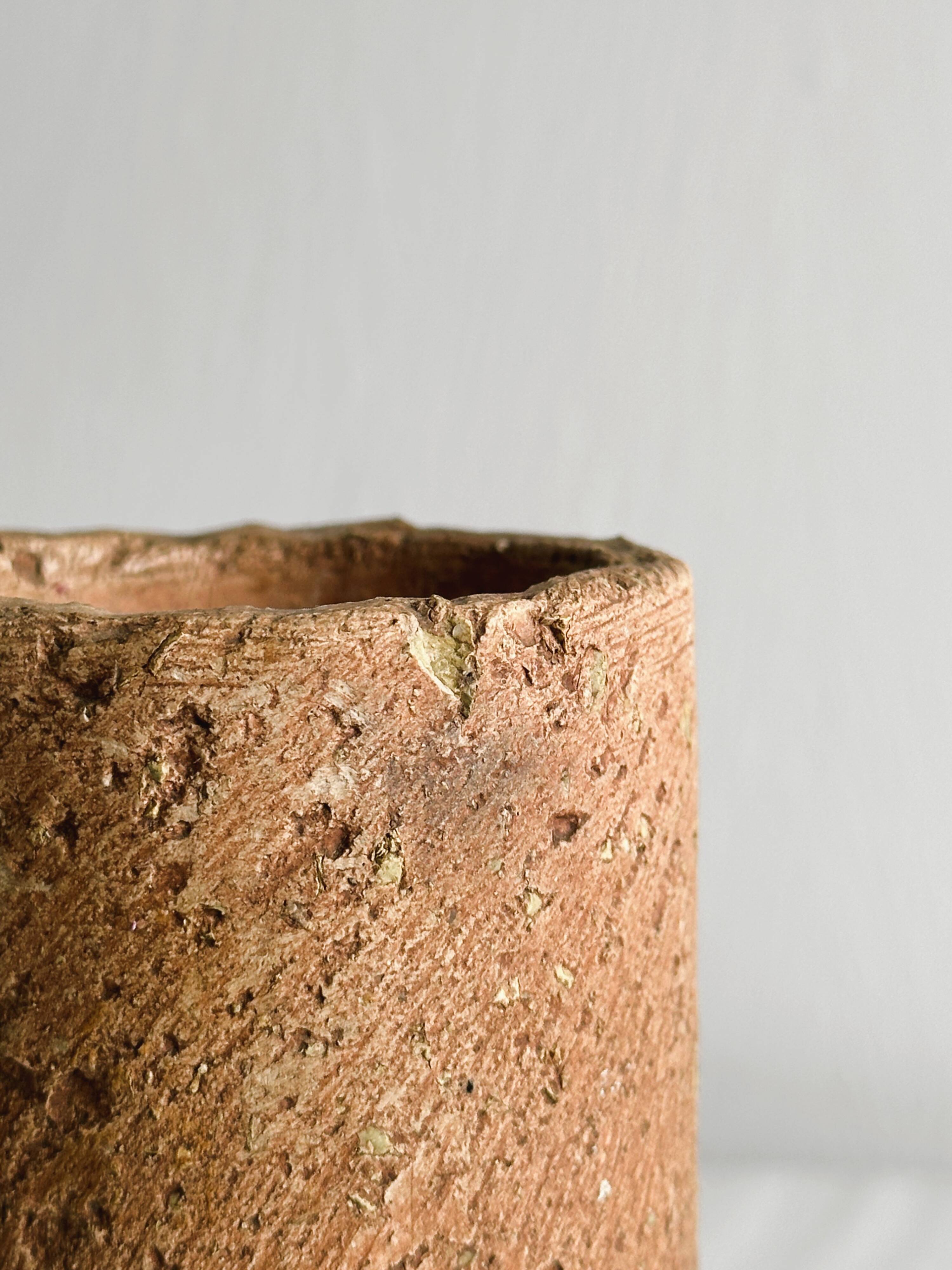 Small vase in raw ceramic, minimalist design