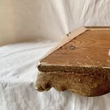 Old wall frame in carved gilded wood