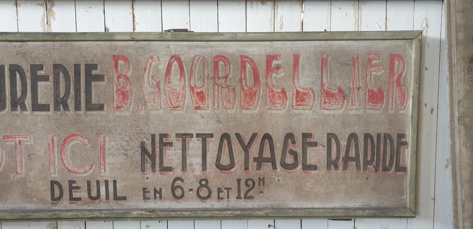 former big wooden advertising sign