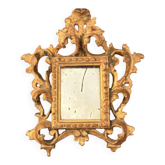 Small old carved and gilded wood mirror