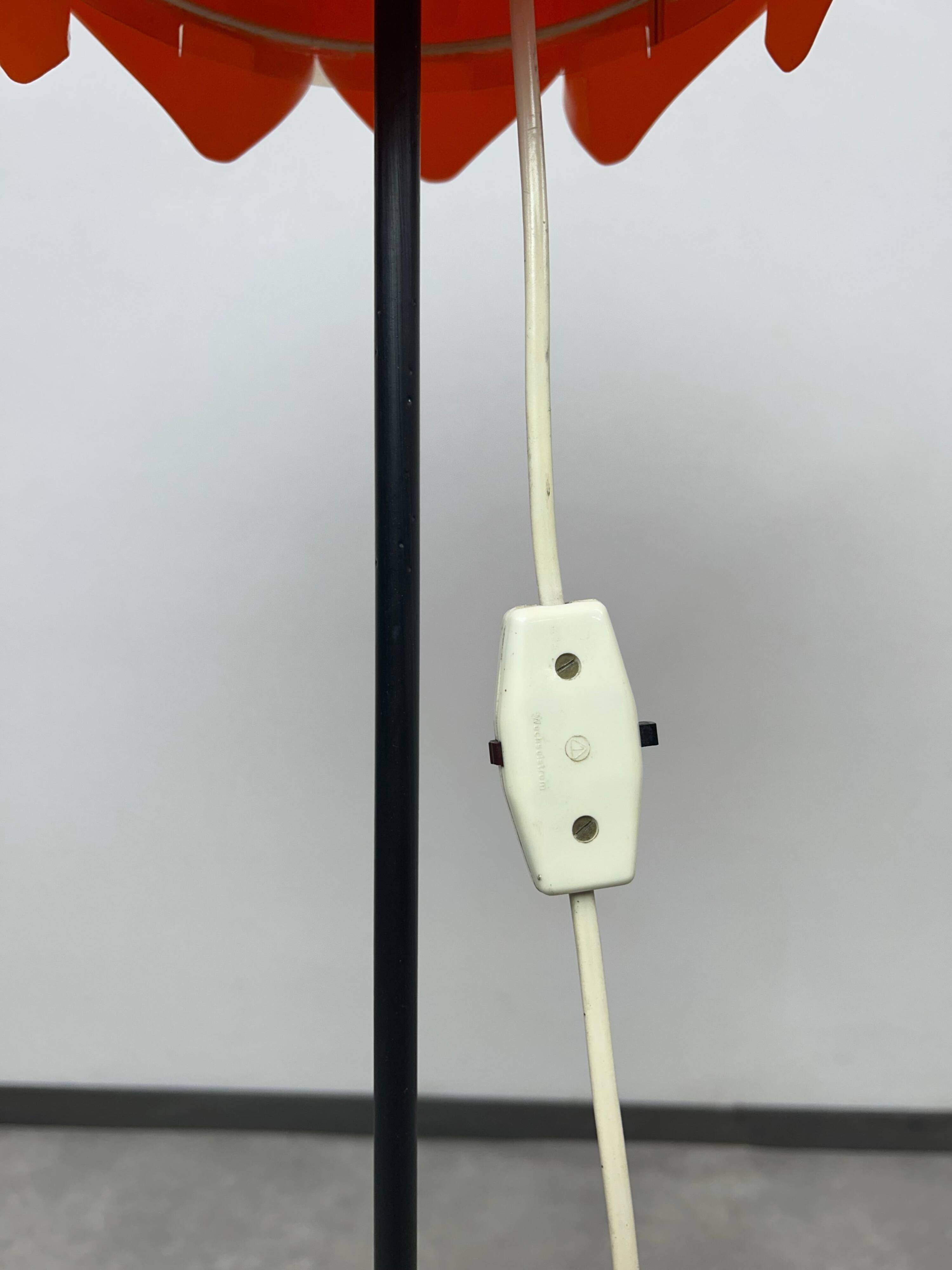 Orange floor lamp by Milanda Havlova - Vest Leuchten