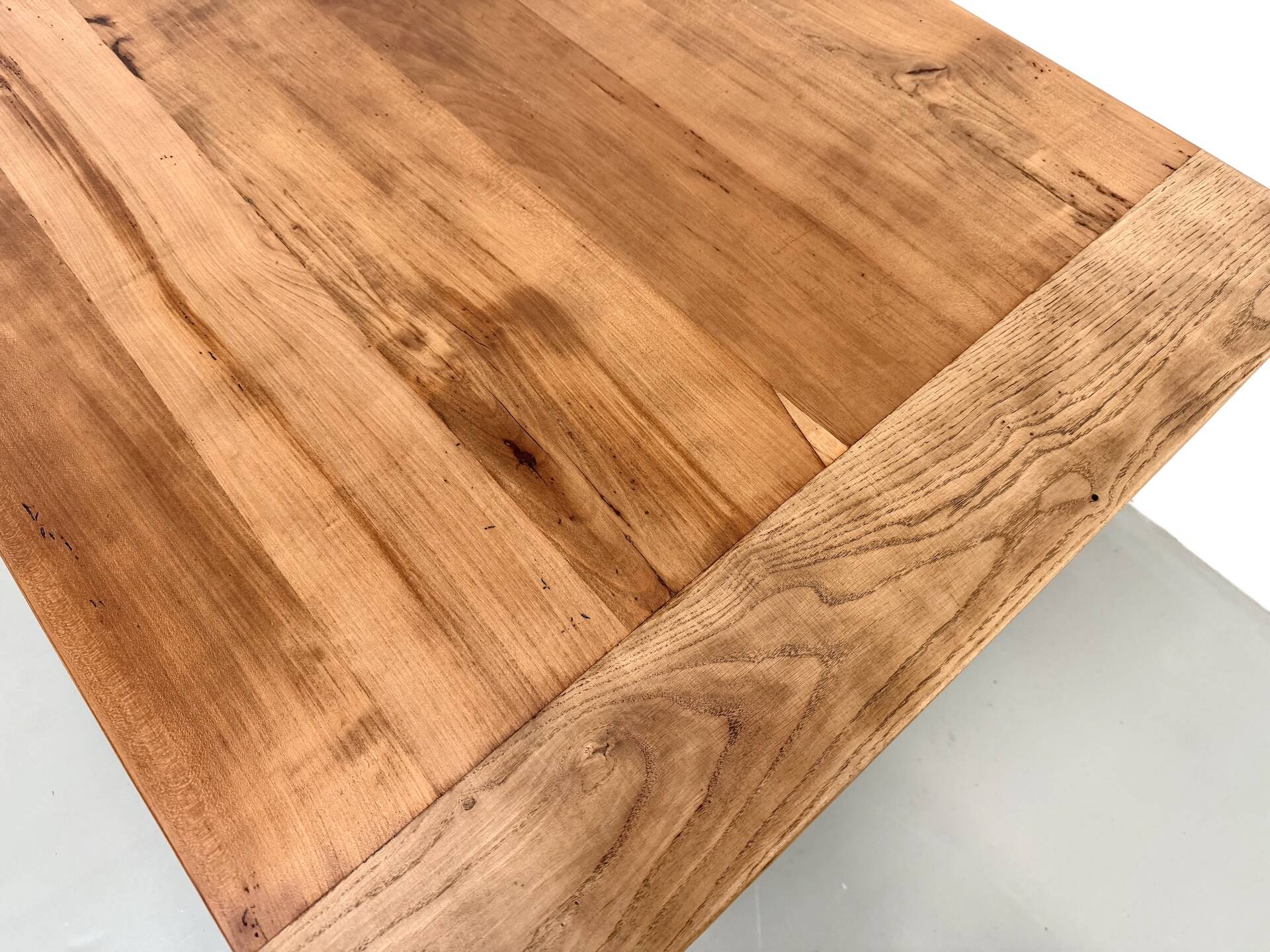 Farm table in solid cherry — Saber legs, Circa 1880