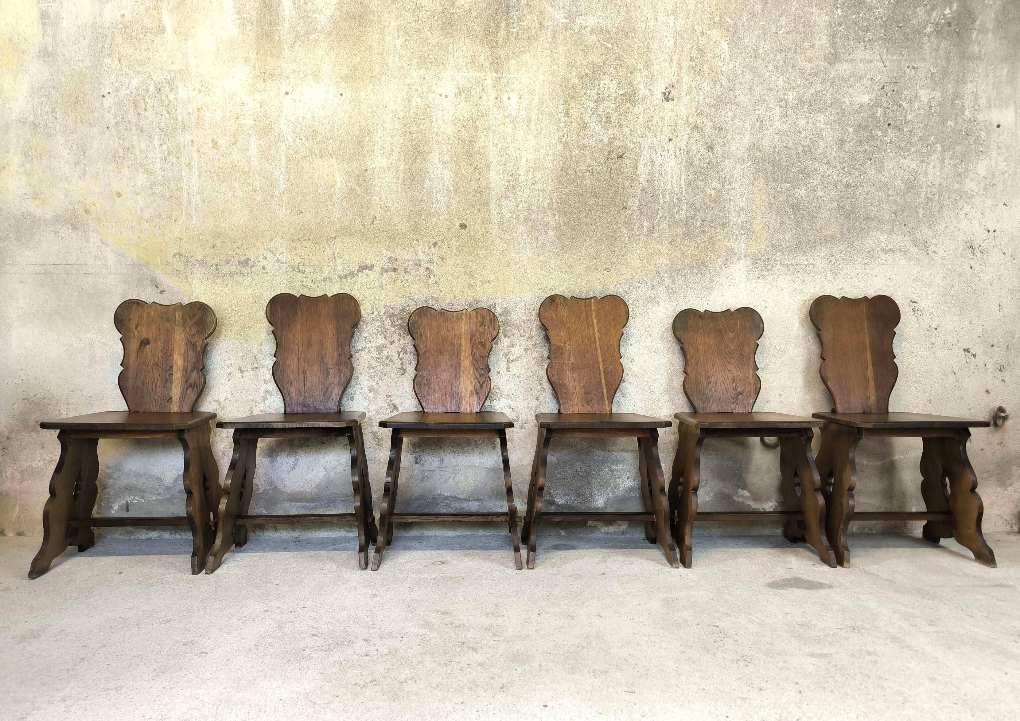 Set of six vintage brutalist wooden chairs.