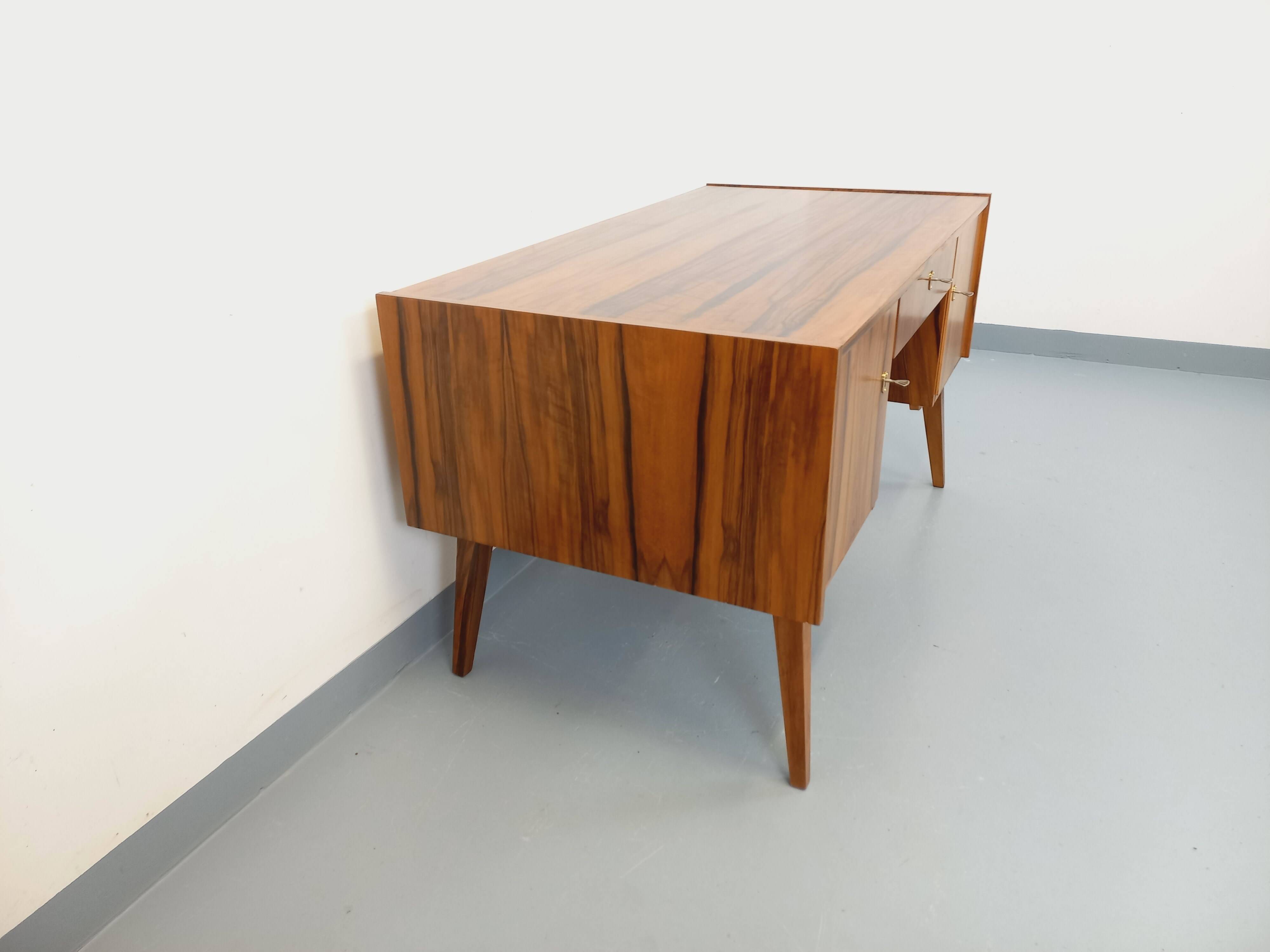 Double-sided executive desk in vintage Scandinavian style made of rosewood.