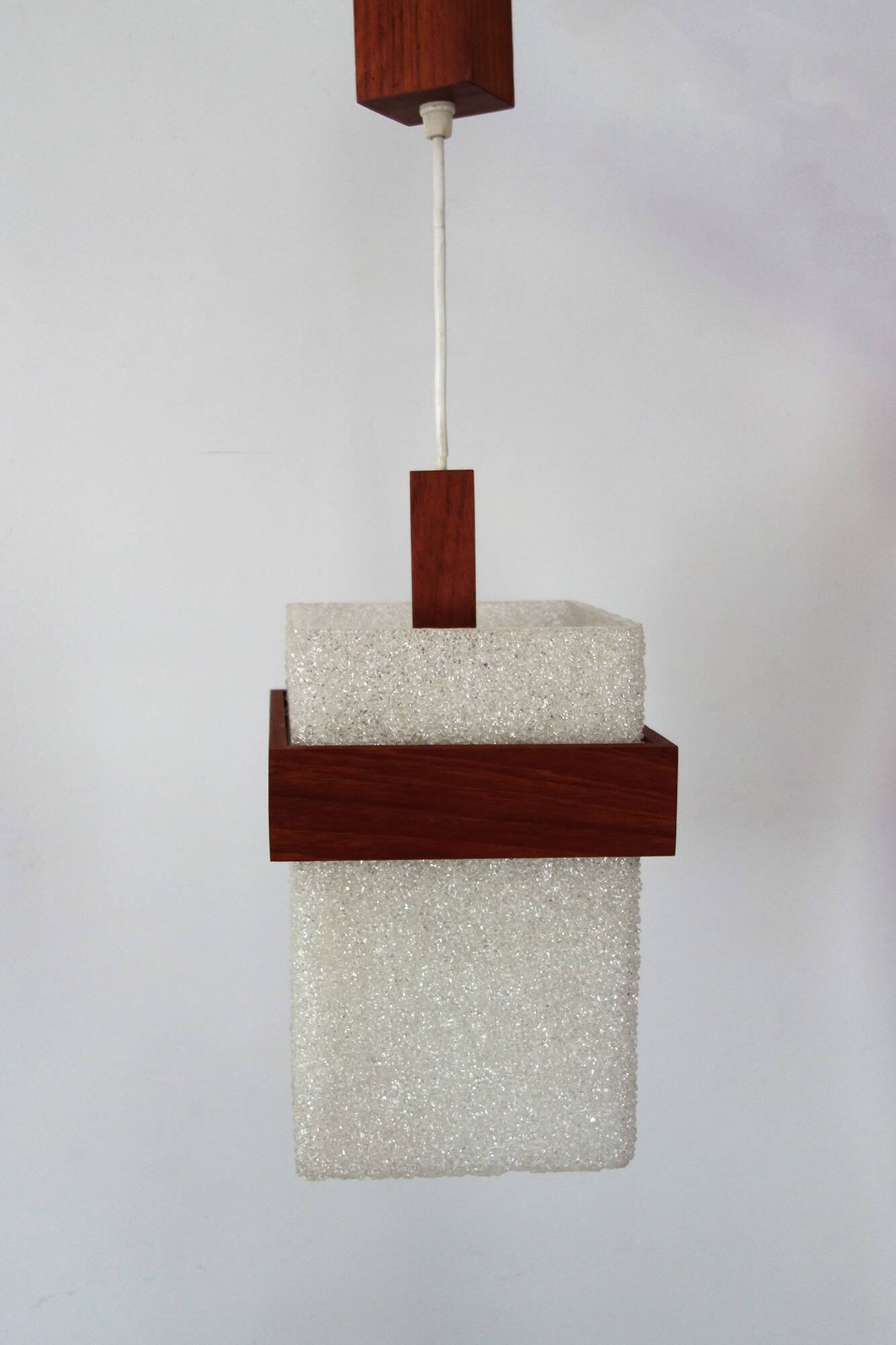 Scandinavian suspension in perspex and teak from the 60s/70s.