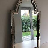 Mirror consisting of multi-faceted mirrors and brass garlands, French work, around 1970
