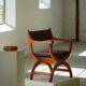 Henning Kjærnulf, pair of oak armchairs, model "Kurul", Danish modern style, 1960s.