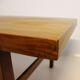 Table basse en teck avec feuille d'extension noire, design danois, années 1960.