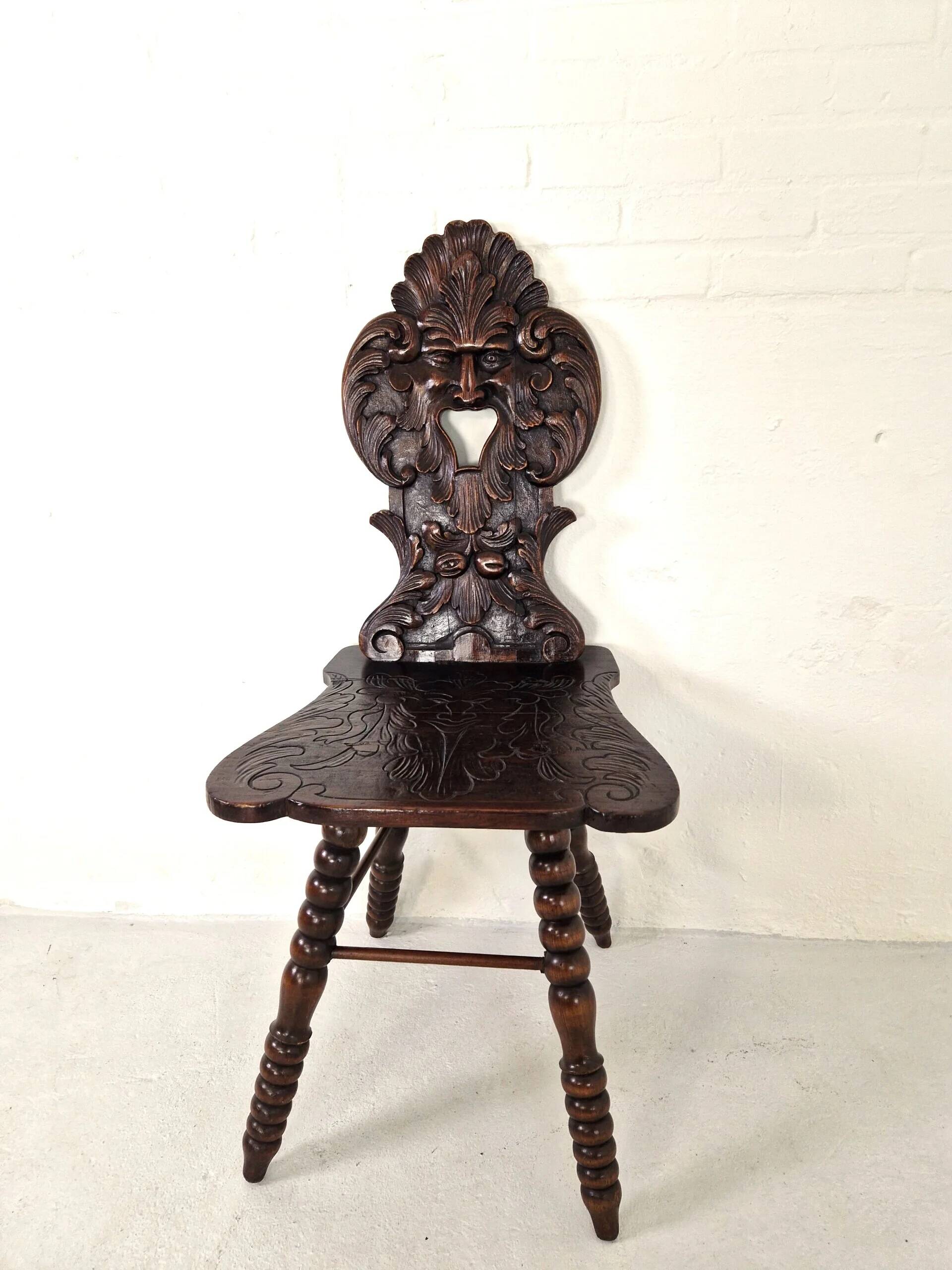 Antique Gothic hall chair with bobbin legs