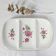 Plat de service trois compartiments en porcelaine à décor d'églantines roses