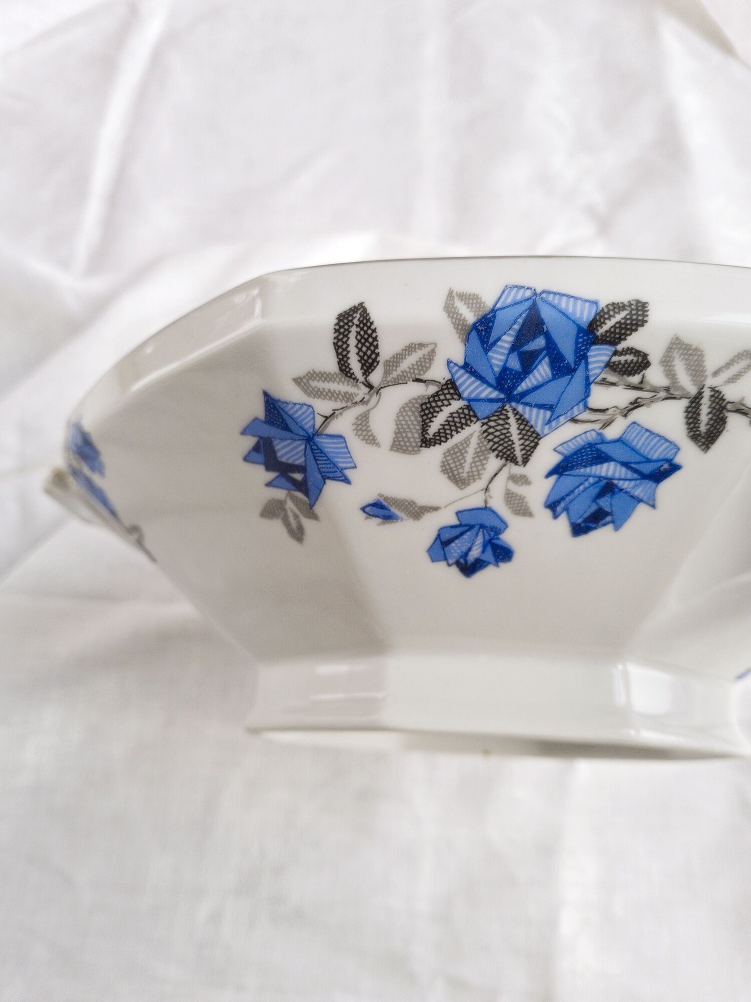 Old porcelain hollow dish of Limoges blue flowers