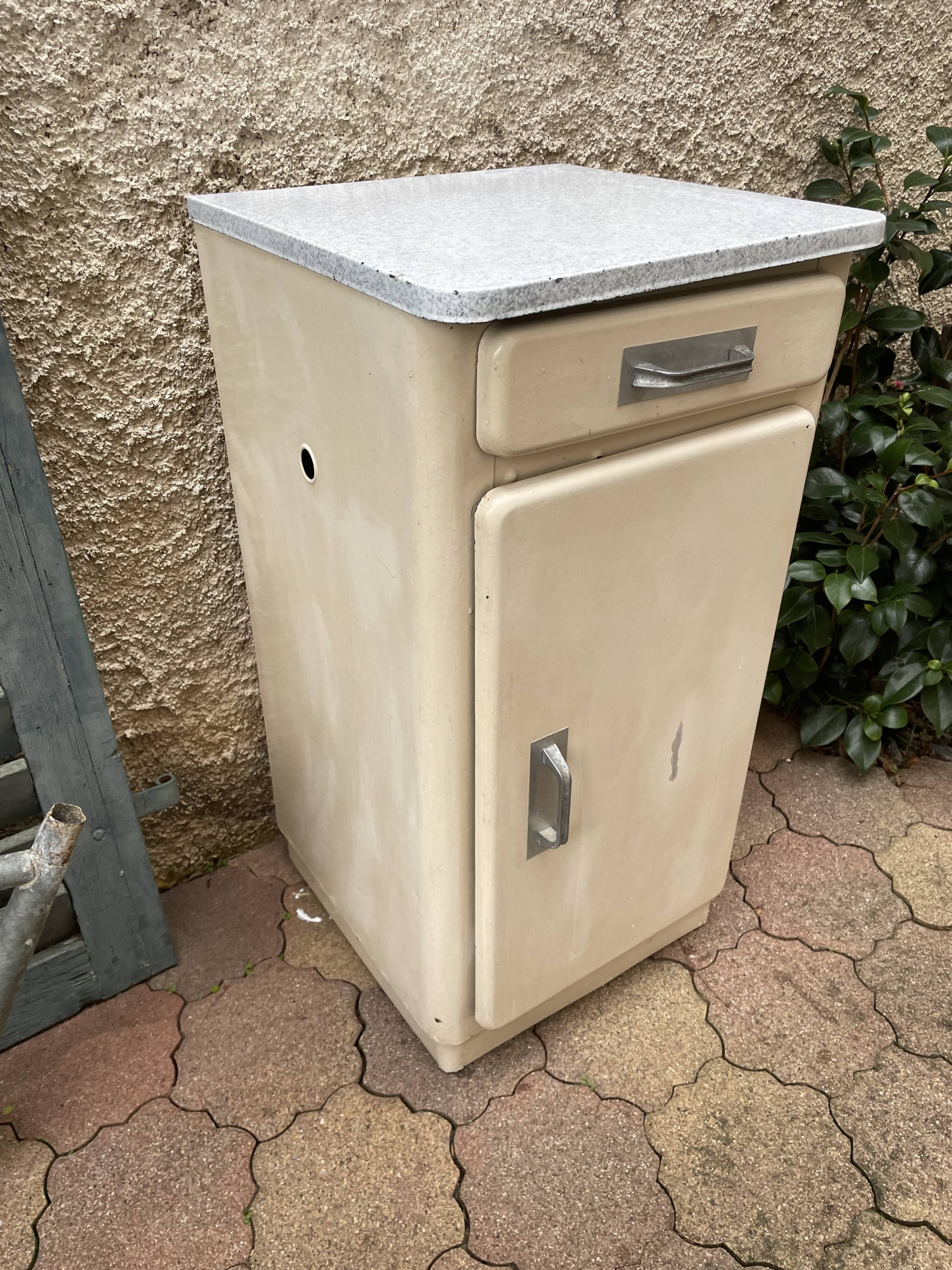 Furniture stored bottle in enamelled sheet metal