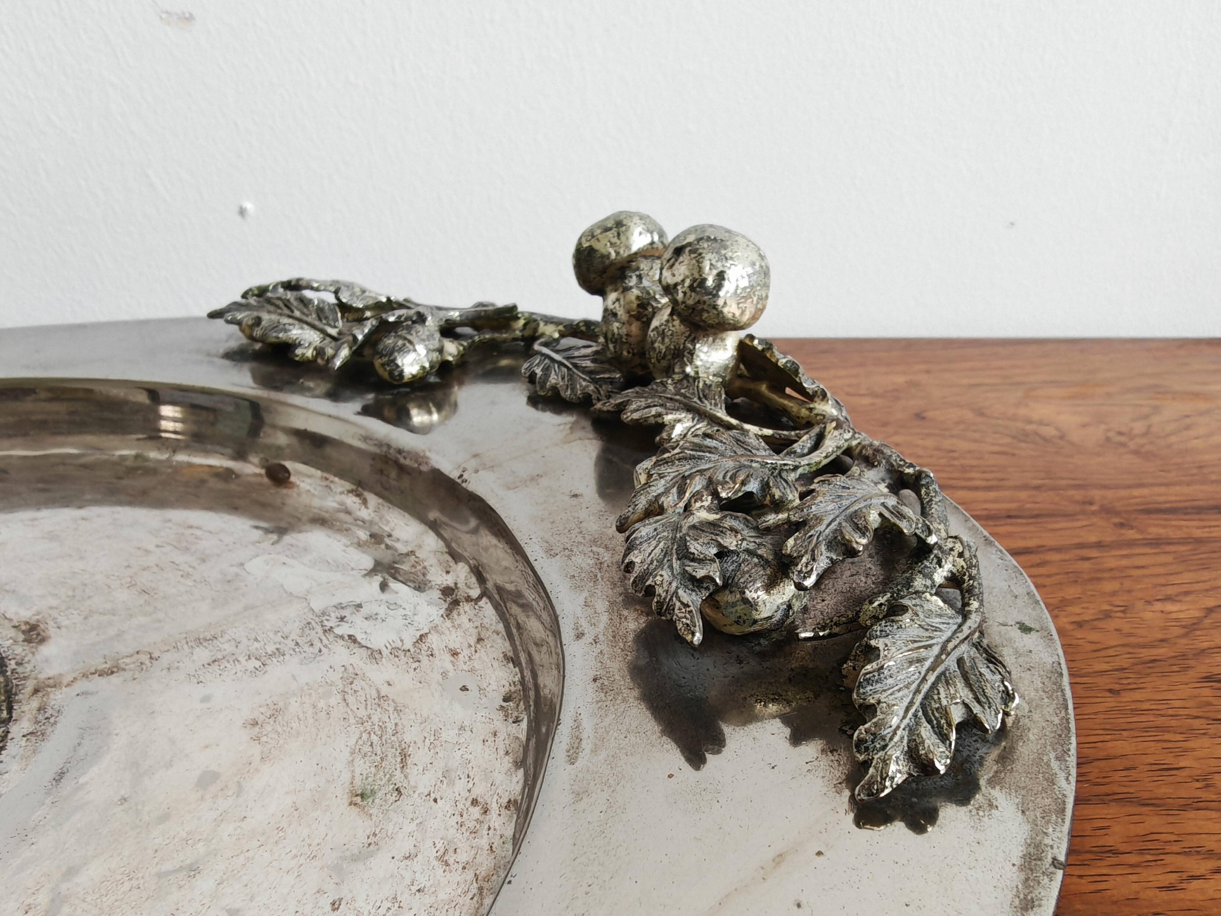 Silver serving dish by Franco Lapini with boar sculpture.