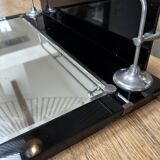 Vintage black mirror from the 1930s/40s with shelf.