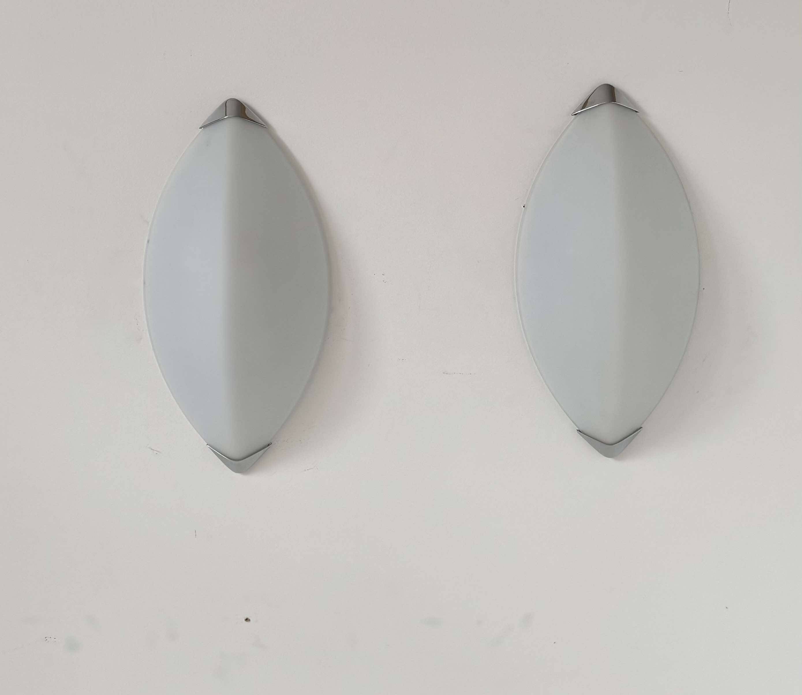 Pair of vintage wall lights, chrome and sandblasted glass, Italy 1980.