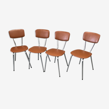4 metal chairs and brown skai