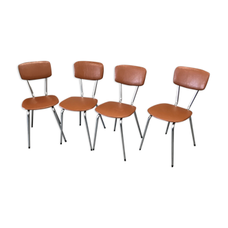 4 metal chairs and brown skai