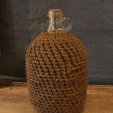 Cylinder glass surrounded by rope