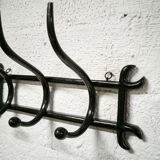 Wall coat rack in curved wood